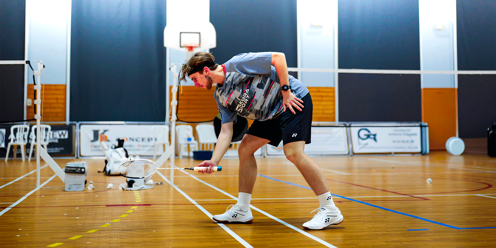 Badminton · vue du terrain pendant un échange